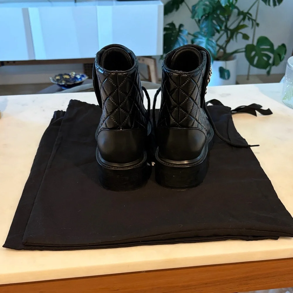 CHANEL Black Quilted Lace-Up Combat Boots with Gold Hardware. Size 39